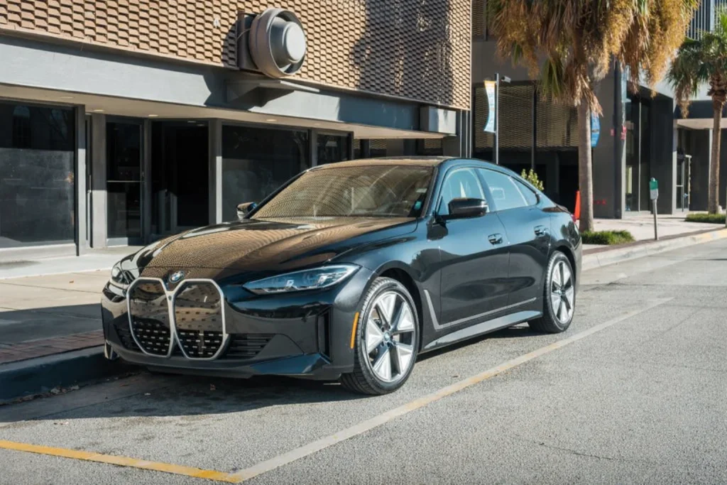 Blaine black car service sedan at a quiet curb near the border