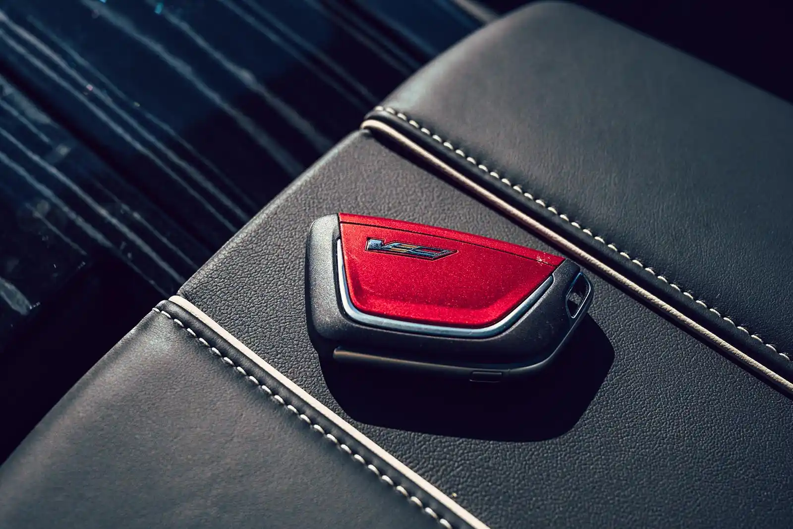 black luxury sedan parked in front of a modern Bellevue high-rise at sunrise, chauffeur opening the rear door, travelers with carry-on luggage, clean urban Pacific Northwest set...