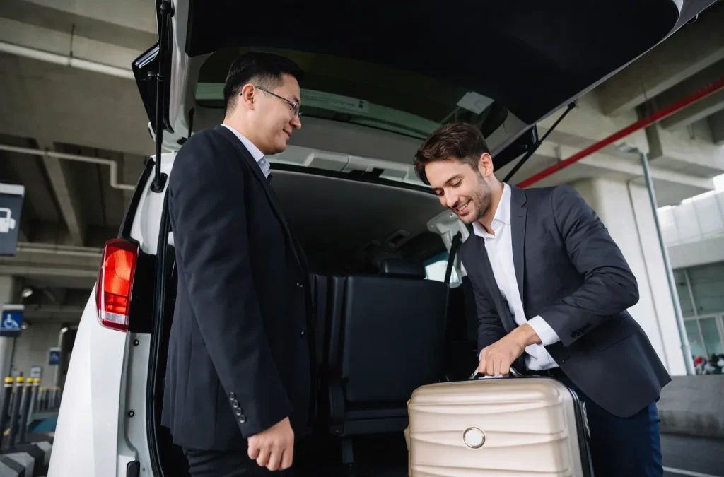 traveler coordinating a pickup with luggage